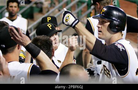 Pittsburgh Pirates' Jason Bay, right, talks with manager John