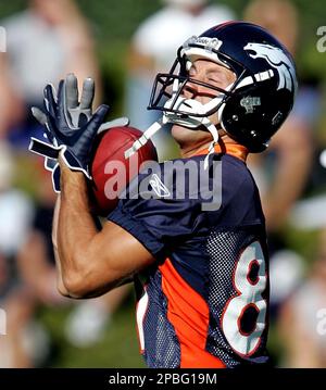 FILE - Denver Broncos wide receiver Jerry Jeudy (10) adjusts his equipment  before an NFL football game against the Las Vegas Raiders, Sunday, Dec. 26,  2021, in Las Vegas. At the request