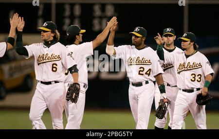 Apr 09, 2007 - Oakland, CA, USA - Oakland Athletics' NICK SWISHER swings  and misses to strike out against the Chicago White Sox in the sixth inning  of their Major League Baseball