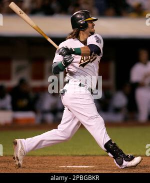 Apr 09, 2007 - Oakland, CA, USA - Oakland Athletics' NICK SWISHER swings  and misses to strike out against the Chicago White Sox in the sixth inning  of their Major League Baseball