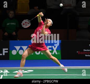 Muelheim, Germany. 12th Mar, 2023. An Se Young of South Korea hits a return during the women's singles final match against Yamaguchi Akane of Japan at the Yonex German Open 2023 badminton tournament in Muelheim, Germany, March 12, 2023. Credit: Ren Pengfei/Xinhua/Alamy Live News Stock Photo