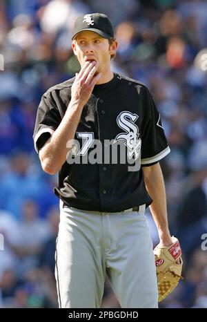 Chicago White Sox pitcher Mike Clevinger pulls his hair back during an MLB  spring training baseball practice, Saturday, Feb. 18, 2023, in Phoenix. (AP  Photo/Matt York Stock Photo - Alamy