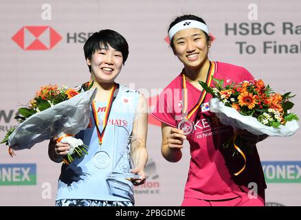 Muelheim, Germany. 12th Mar, 2023. Yamaguchi Akane (L) of Japan and An Se Young of South Korea pose during the awarding ceremony of the women's singles at the Yonex German Open 2023 badminton tournament in Muelheim, Germany, March 12, 2023. Credit: Ren Pengfei/Xinhua/Alamy Live News Stock Photo