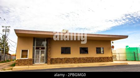 Abandoned Commercial Building With Broken Windows Stock Photo
