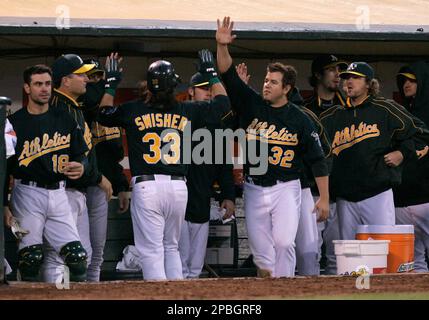 Apr 09, 2007 - Oakland, CA, USA - Oakland Athletics' NICK SWISHER swings  and misses to strike out against the Chicago White Sox in the sixth inning  of their Major League Baseball