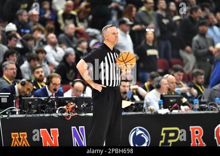 Chicago, Illinois, USA. 12th Mar, 2023. Official waiting for players to return to play during the NCAA Big Ten Conference Men's Basketball Tournament Championship at United Center in Chicago, Illinois. Dean Reid/CSM/Alamy Live News Stock Photo