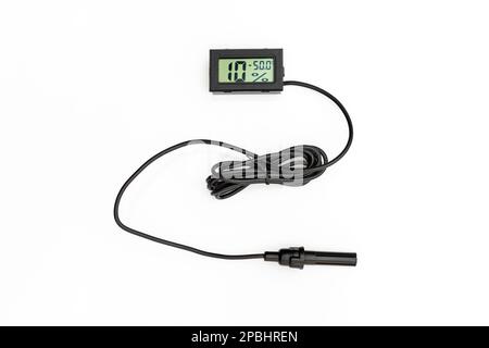 Digital thermometer with external sensor on the cable. Stock Photo