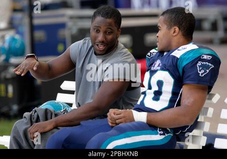 Hamburg's Running Back Quentin Griffin, right, is tackled by Rhein Fire's  Jermaine Hardy, left, during the European football league, NFL Europe,  match between Hamburg Sea Devils and Rhein Fire at the AOL