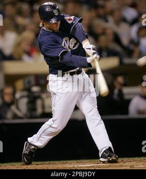 San Diego Padres' Khalil Greene watches his ground ball single to left  field to drive in the tying run in the eighth inning against the Arizona  Diamondbacks in their baseball game in