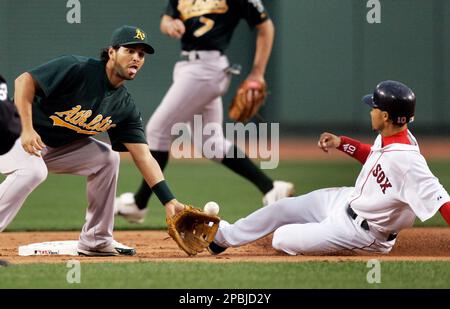 Boston Red Sox's Coco Crisp beats out an infield single as the