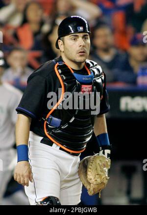 New York Mets catcher Paul Lo Duca reacts after he throws to first to get  Florida Marlins pitcher Scott Olsen who bunted during the sixth inning of  their baseball game, Monday, April