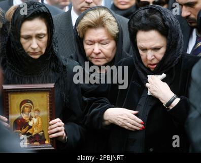 The widow, no name given, and daughter, Lera, of Capt. Andrei Milyutin ...