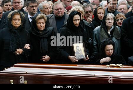 The widow, no name given, and daughter, Lera, of Capt. Andrei Milyutin ...