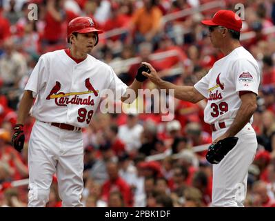 St. Louis Cardinals' So Taguchi (99), of Japan, is congratulated