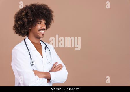 Smiley african doctor in uniform and stethoscope Stock Photo