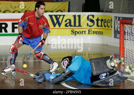 Roller Hockey Goalie makes a save Stock Photo - Alamy