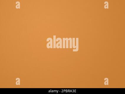 Yellow ocher paper texture background. clean horizontal wallpaper Stock Photo