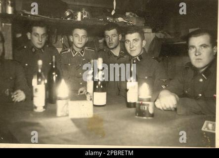 World War Two B&W photo German Waffen SS men celebrate Christmas in a Bunker on the Russian Front 1942 Stock Photo