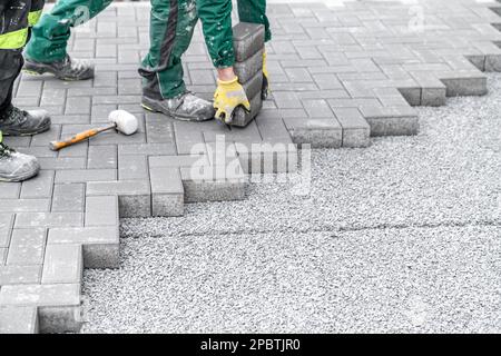 construction of a sidewalk from concrete blocks Stock Photo
