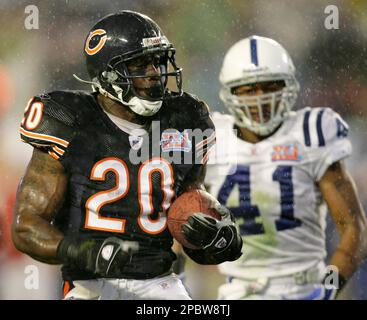 Chicago Bears running back David Montgomery (32) is tackled by Detroit  Lions linebacker Jalen Reeves-Maybin (44) during the second half of an NFL  football game, Sunday, Oct. 3, 2021, in Chicago. (AP