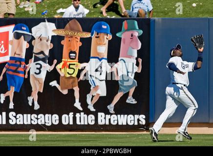 Milwaukee Brewers' J.J. Hardy slides home during the fourth inning of a  baseball game Thursday, May 14, 2009, in Milwaukee. (AP Photo/Morry Gash  Stock Photo - Alamy