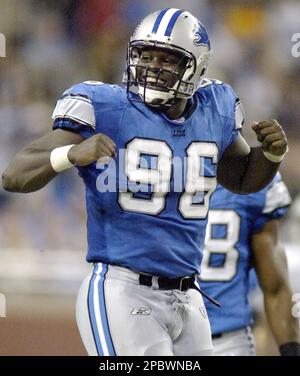 Green Bay Packers defensive end Dean Lowry (94) is blocked by Detroit Lions  offensive tackle Penei Sewell (58) during the first half of an NFL football  game Sunday, Nov. 6, 2022, in