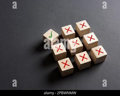 Choosing the right option, voting yes or approval concept. Check mark right symbol stands out from the wrong symbols. Stock Photo