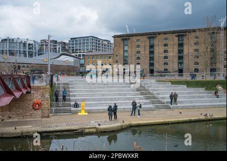 View across Regents Canal of Granary Square and Coal Drops Yard. Kings Cross, London, England, UK Stock Photo