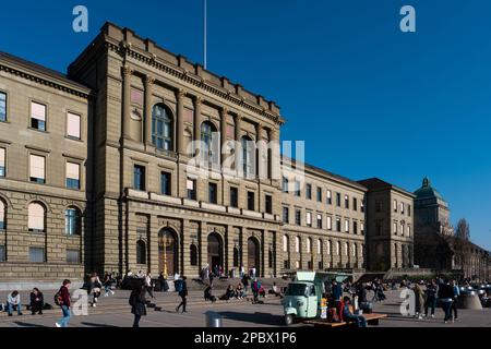 ETH University Zurich, Switzerland. Daytime, blue sky, wide angle view. Students enjoying their break sitting outside. Stock Photo