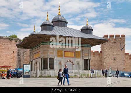 Istanbul, Turkey - May 09 2019: The Fountain of Sultan Ahmed III is a fountain in a Turkish rococo structure in the great square in front of the Imper Stock Photo