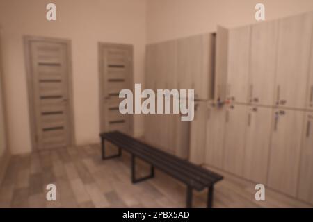 Blurred view of changing room with lockers Stock Photo - Alamy