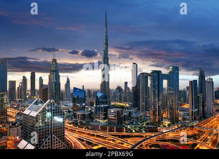 Dubai skyline at twilight with traffic - aerial view, United Arab ...
