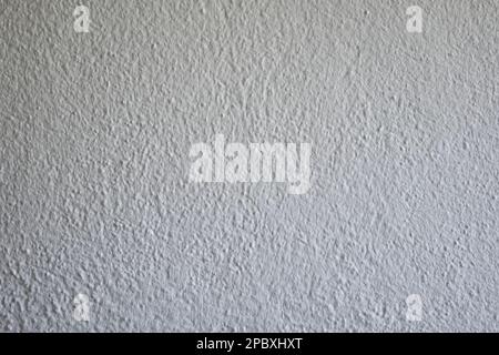White grainy stucco wall texture, no people. Stock Photo