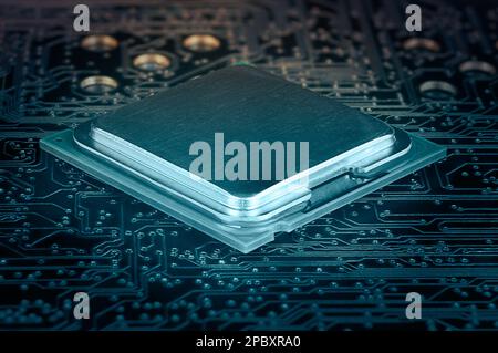 LGA package CPU IC close up on printed circuit board background Stock Photo