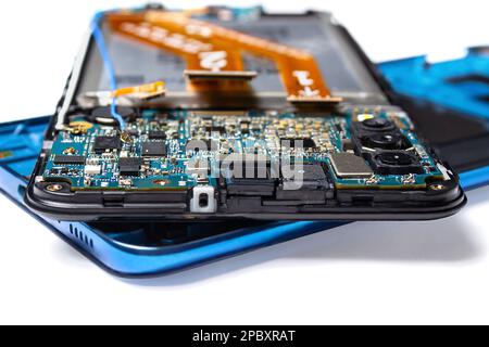 main case and back cover of disassembled blue smartphone isolated on white background close up Stock Photo