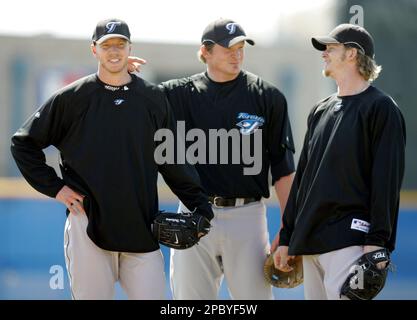 From left, Philadelphia Phillies pitchers Roy Oswalt, Joe Blanton and Roy  Halladay enter the ballpark in their green St. Patrick's Day jersey prior  to action against the Toronto Blue Jays at Bright