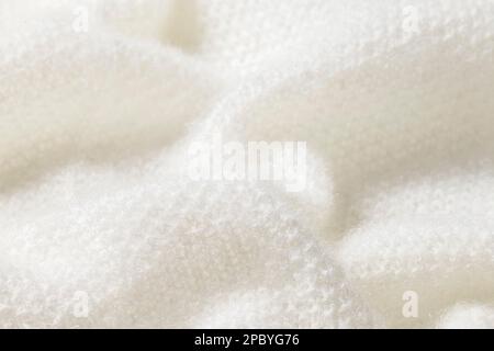 Soft and smooth white textile, warm cloth in close up Stock Photo