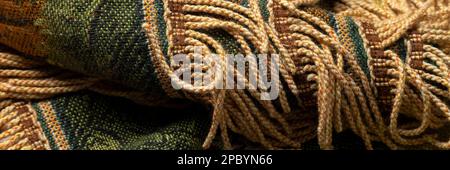 Close up view of antique piece of handmade carpet, textile detail Stock Photo