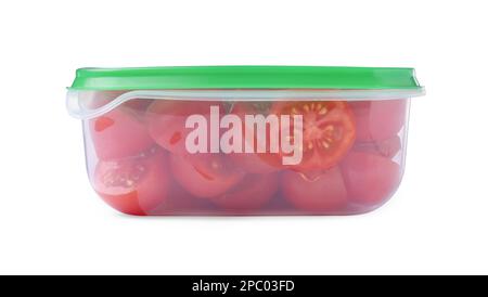 Fresh cut cherry tomatoes in plastic container isolated on white Stock Photo