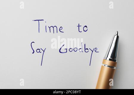 Pen and phrase Time to say Goodbye written on white paper, top view Stock Photo