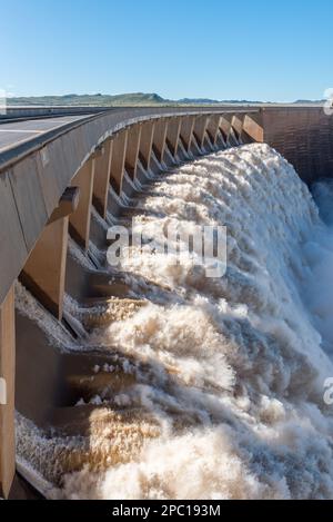 The Gariep Dam overflowing. The dam is the largest in South Africa. It is in the Orange River on the border between the Free State and Eastern Cape Pr Stock Photo