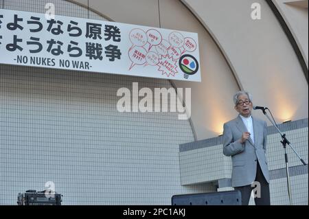 Nobel prize winner Kenzaburo Oe speaks at protest against Prime Minister Shinzo Abe's security policies and nuclear power in Tokyo on September 23, 2015. Some 25,000 people participated according to the organizers. Stock Photo