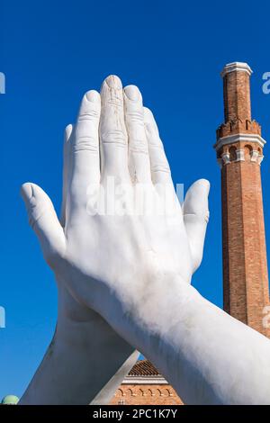 part of Building Bridges sculpture by artist Lorenzo Quinn depicting pairs of monumental hands at Venice, Italy Stock Photo