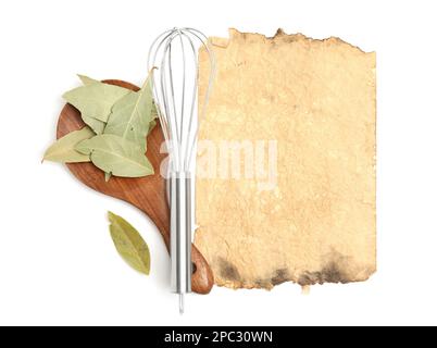 Old cookbook page, spice and kitchen utensils on white background, top view. Space for text Stock Photo