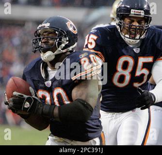 Chicago Bears running back Thomas Jones turns the corner against