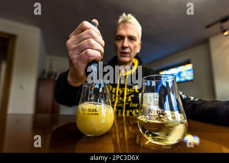 https://l450v.alamy.com/450v/2pc3d6x/stefan-fritsche-managing-director-of-klosterbrauerei-neuzelle-stirs-the-driest-beer-in-the-world-with-a-milk-frother-beer-powder-and-water-become-beer-stephan-fritsche-managing-director-of-the-german-klosterbrauerei-neuzelle-monastery-brewery-demonstrates-the-novel-beer-powder-under-development-2pc3d6x.jpg