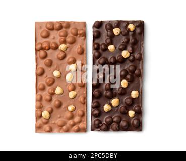 Dark and milk chocolate isolated. Handmade chocolate with nuts. Chocolate bars on a white background top view. Stock Photo