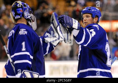 Swedish player and Toronto Maple Leafs captain Mats Sundin, with teammate  Bryan McCabe by his side, is honored by his team for scoring his 500th goal  last Saturday during a pre-game ceremony