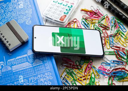 In this photo illustration a Microsoft Excel logo seen displayed on a smartphone. Stock Photo