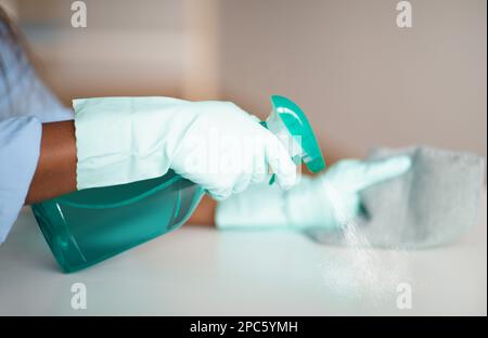 Unrecognizable maid hands cleaning apartment, house-keeping service concept Stock Photo